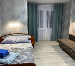 Четырёхместный номер Standard с красивым видом из окна в Дюна-центр