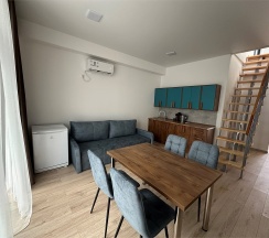 Двухуровневый ПОЛУЛЮКС с зоной отдыха на крыше в Santorini Family Club