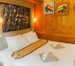 Двухместное бунгало с видом на сад двуспальная кровать в Ricci House Resort