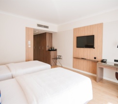 Номер "Стандарт" с двумя раздельными кроватями в Кортъярд Марриотт Сочи Красная Поляна