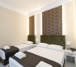 Трёхместный номер Deluxe в Modern Luxury Hotel