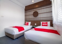 Двухместный номер Premium 2 отдельные кровати в OYO 994 Kudi Hostel