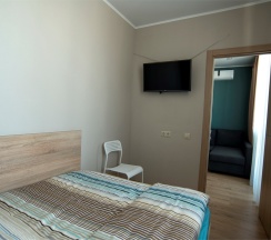 Апартаменты с гостиной и 2 спальнями. Вид на реку Казанку и аквапарк "Ривьера" в Sibgat Apartments