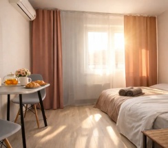Двухместный номер Comfort с балконом и с красивым видом из окна (двуспальная кровать) в Апартаменты Уютно как дома с балконом