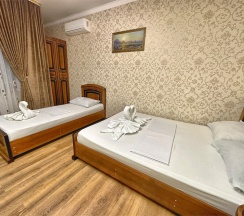 Четырехместный номер /Без питания или ALL INCLUSIVE + BAR в Лооотель