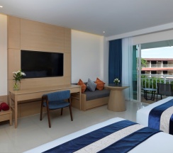 Двухместный номер Grand Deluxe с балконом и с видом на сад двуспальная кровать в Chanalai Flora Resort, Kata Beach