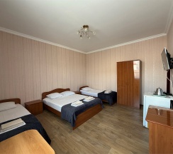 Стандартный четырехместный комната в Das house