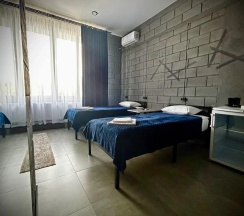 Двухместный номер с двумя раздельными кроватями в Hotel Loft