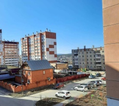 Апартаменты студия с 2 односпальными кроватями в Уютная студия на улице Заря 27Б