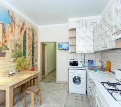 Апартаменты c 1 комнатой с балконом и рядом с пляжем в Апартаменты Apartment on Primorskaya