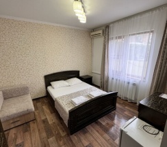 Номер с двуспальной кроватью в Киви