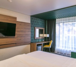 Номер делюкс в Sun Village Arkhyz