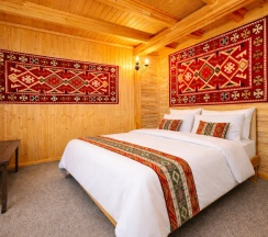 Двухкомнатный улучшенный стандарт с видом на горы | без балкона | 2 этаж в Hayat Haus