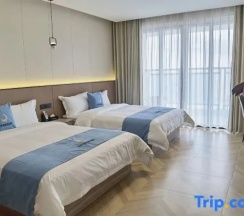 Двухместный номер Standard с балконом и с видом на море 2 отдельные кровати в Taishan Golden Beach Resort