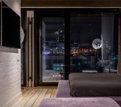 Room for romantic. Мансарда с террасой и камином размещение 1-2 человека. в Nikolaevbuilding