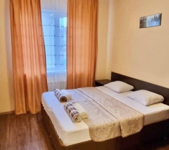 Семейный люкс с 2 комнатами с балконом и с красивым видом из окна в Наш дом