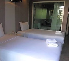 Двухместный номер Deluxe 2 отдельные кровати в Inn Place Serviced Residence