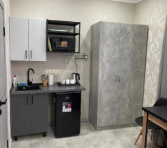 Двухместный номер Standard с балконом двуспальная кровать в Гостевой дом на Октябрьской