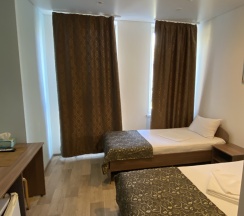 Стандартный номер с 2 отдельными кроватями  в White House