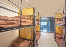 Кровать в общем номере в OYO 723 Lamphun Hostel