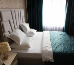 Четырехместный стандартный номер с мини-диваном в Хан