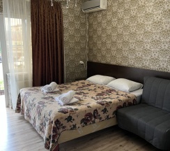 Двухместный номер Comfort с балконом и с красивым видом из окна двуспальная кровать в Тропики