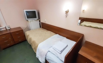 Кровать в 3-местном общем номере в Smart Hotel KDO Белгород