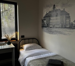 Кровать в 3-местном общем женском номере в Прусс