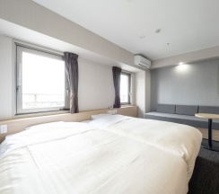 Двухместный семейный номер Standard 2 отдельные кровати в Natural Hot Springs Spa Hotel Hananoi Osaka