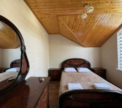 Многоместный смешанный номер Двухкомнатный люкс с кухней 10 в Счастливый слон