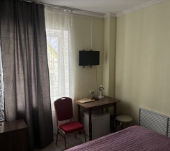 Двухместный номер категории «Стандарт» с одной двуспальной кроватью в Концерт на Таганской