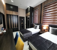 Номер Luxury в Home Hotel