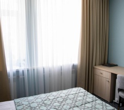 Номер стандарт улучшенный с 1 двуспальной кроватью в Хабаровск