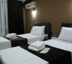 Двухместные апартаменты Deluxe с 3 комнатами двуспальная кровать в Отель Grand Avenue