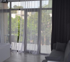 Трёхместный номер Standard с балконом в Guest House Madonna