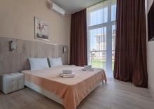 Апартаменты улучшенные с двумя двуспальными кроватями кв. 104 в Deluxe apartments