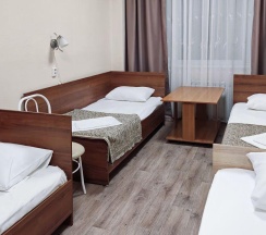 Кровать в 4-местном общем номере в Smart Hotel KDO Миасс