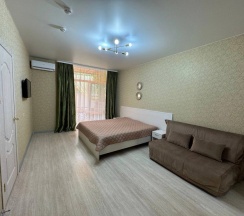 Двухместные апартаменты с красивым видом из окна двуспальная кровать в Мелис