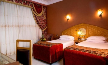 Трёхместный номер с видом на бассейн в Oriental Rivoli Hotel & SPA
