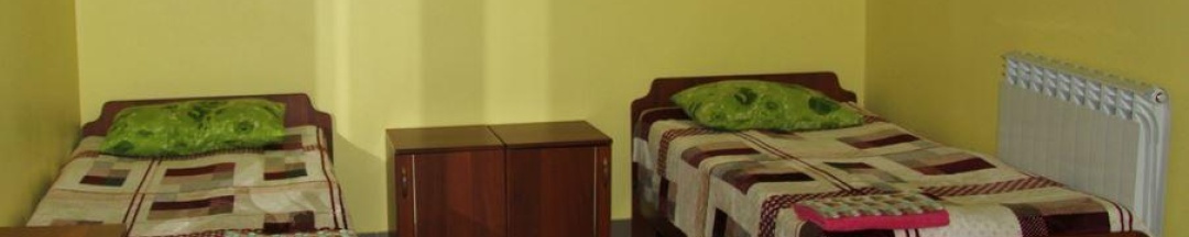 Кровать в 2-местном общем номере в Мила
