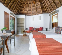 Четырёхместный номер Palapa Oasis в Shangri-la Caribe Beach Village Resort