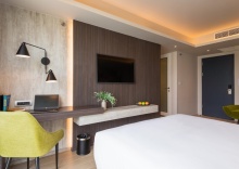 Номер Deluxe в Maitria Rama 9 Bangkok - A Chatrium Collection Hotel