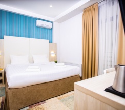 Делюкс с кроватью KING SIZE для 2 гостей в Мио