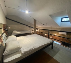 Семейные двухуровневые апартаменты с кухней в Loft Apart