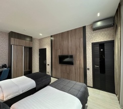 Двухместный номер Deluxe двуспальная кровать в Home Hotel