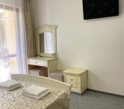 Номер с двуспальной кроватью в Киви