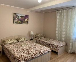 Четырехместный номер с 1 двуспальной или 2 односпальными кроватями в Танго