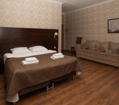 Двухместный номер с диваном Comfort двуспальная кровать в Снежная королева