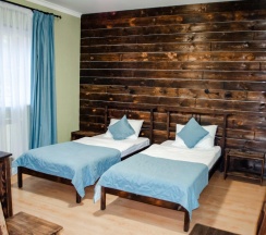 Номер стандарт с 2 односпальными кроватями в Альпийский двор