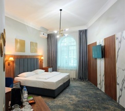 3 этаж I Двухкомнатный номер с двуспальными кроватями в Марис